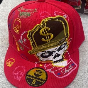 Red Cap with Skull and Dollar Sign Design